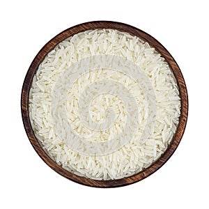 Jasmine rice in wooden bowl isolated on white background. Top view