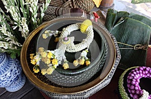 Jasmine Wreath with Yellow Roses on Pedestal Dish