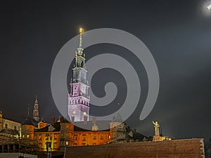 Jasna Gora Monastery in Czestochowa at night. The inscription on the banner in Polish Jesus meets his mother