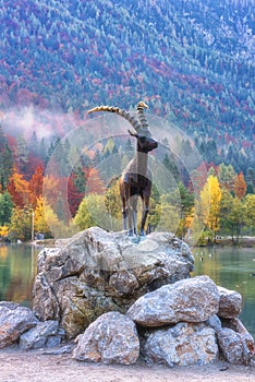 Jasna lake in Triglav national park at sunrise, Kranjska Gora, Slovenia. Amazing autumn landscape with Alps mountains