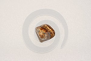 Jasper gemstone. on white background. Macro shot