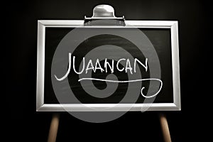 Jaugan - german word for jaugan on blackboard, Handwriting the text \