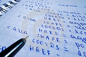 Java program in notepad and black pen. creation of computer programs. the work of the programmer and sisadmida