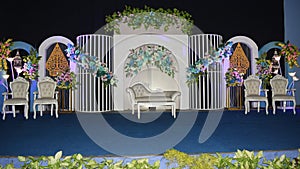 Javanese wedding backdrop design for the bride and groom and the parents