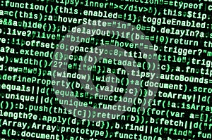 JavaScript code in text editor. Coding cyberspace concept. Screen of web developing code