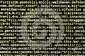 JavaScript code in text editor. Coding cyberspace concept. Screen of web developing code