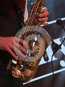 Jazz day festival. Saxophone, music instrument played by saxophonist player musician