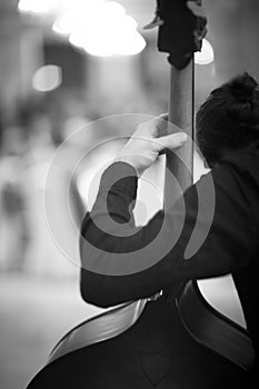 Jazz musician playing double bass musical instrument