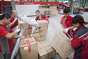 JD.com staff sorting packages