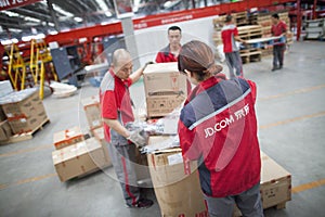 JD.com staff sorting packages