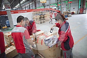 JD.com staff sorting packages