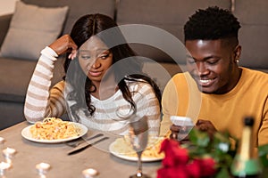 Jealous Black Wife Picking At Husband's Phone During Date Indoor