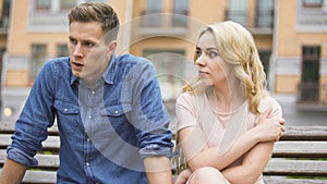 Jealous girl having fight with upset boyfriend, conflict of unhappy people