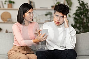 Jealous Korean Wife Showing Cheating Husband His Smartphone At Home