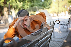 Jealous man spying on ex girlfriend in park