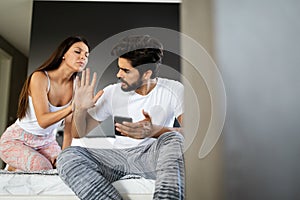 Jealous wife spying her husband mobile phone