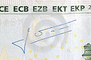 Jean-Claude Trichet`s signature on 100 Euro banknote. Mario Draghi is president of the European Central Bank photo