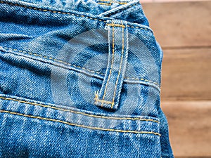 Jean on wood background