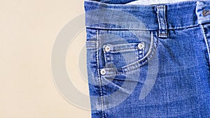 Jeans on the background, blue and black jeans lie on a white background,