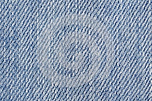 Jeans background. Light blue denim fabric texture