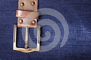 Jeans background. Texture. Leather belt