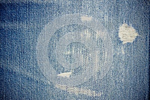 Jeans background worn out denim pattern classic texture blue background of denim canvas photo