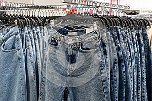 Jeans. Clothing store. Denim clothes. Textile industry. Retail trade