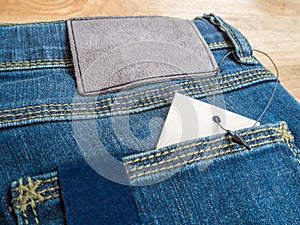 Jeans with deerskin label and price tag