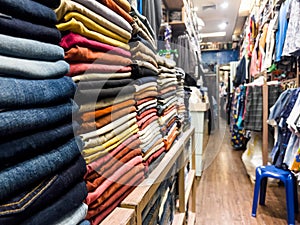 Jeans and Fashion Clothes in clothing store, at Thailand