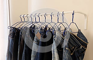 Jeans hanging, drying cloth, men