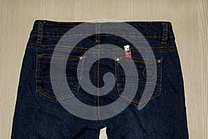 Jeans with a lighter in the pocket. photo