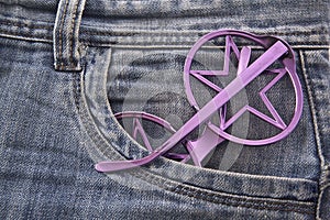 Jeans pocket closeup with glasses