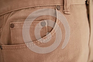 Jeans pocket with seam and thread stitches, blrown, khaki denim jeans texture