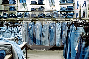 Jeans store in a shopping center. Denim sales. Blue pants. Shopping for women