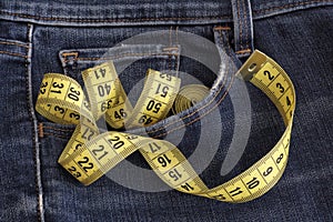 Jeans with tape measure in pocket