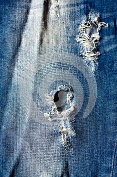 Jeans texture background denim blue with tear