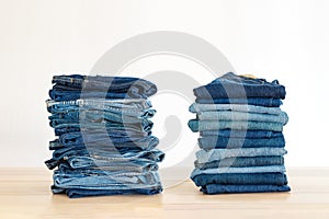 Jeans trousers stack on white background