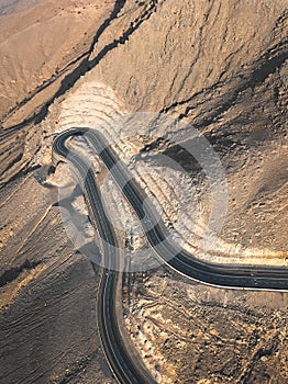 Jebel Jais mountain desert highway road in Ras al Khaimah UAE aerial view