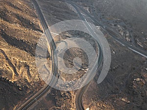 Jebel Jais mountain desert highway road in Ras al Khaimah UAE aerial view