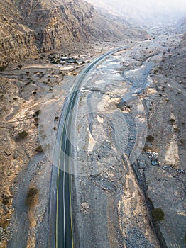 Jebel Jais mountain desert highway road in Ras al Khaimah UAE aerial view