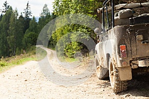 Jeep car 4Ñ…4 adventure travel. Old mountain dust road. Safari adventure. Copy space for text