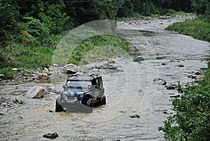 Jeep crossing the river