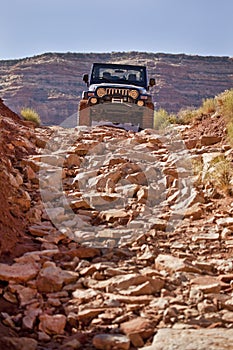 Jeep Descending a Rough Trail