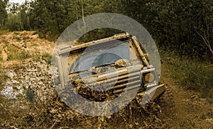 Jeep outdoors adventures. Road adventure. Adventure travel. Tires in preparation for race. Travel concept with big 4x4