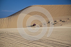 Jeep Safari SUVs on the white dunes of Vietnam,white dunes of Vietnam, near the city of Mui Ne, wheel tracks from jeep ride