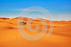 Jeep in sand dunes