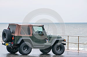 Jeep Wrangler in green. Rugged chunky 4X4.