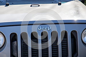 jeep Wrangler logo brand and text sign front American off-road vehicle us