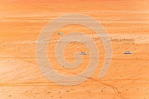 Jeeps are crossing wadi rum desert in Jordan