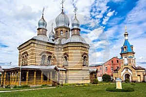 Jekabpils Orthodox Church of The Holy Spirit against bright blue sky